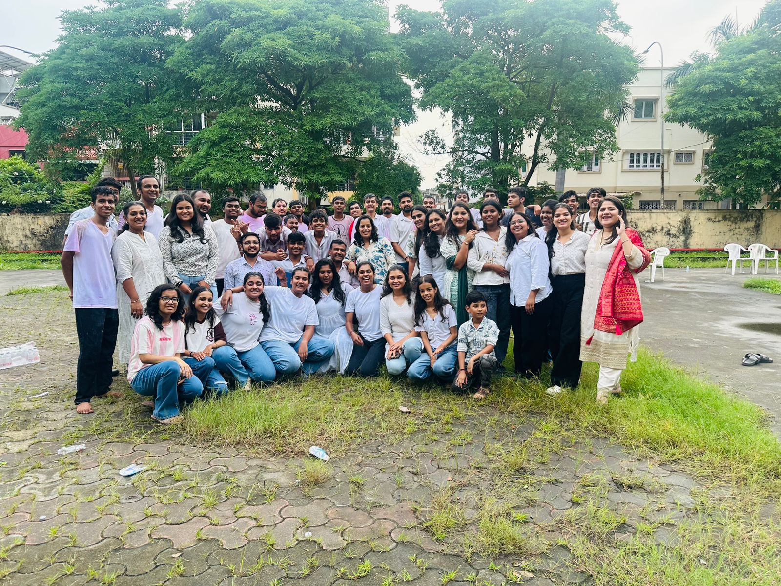 Shree Radhe Garba Group members gathered outdoors during a community day in Surat